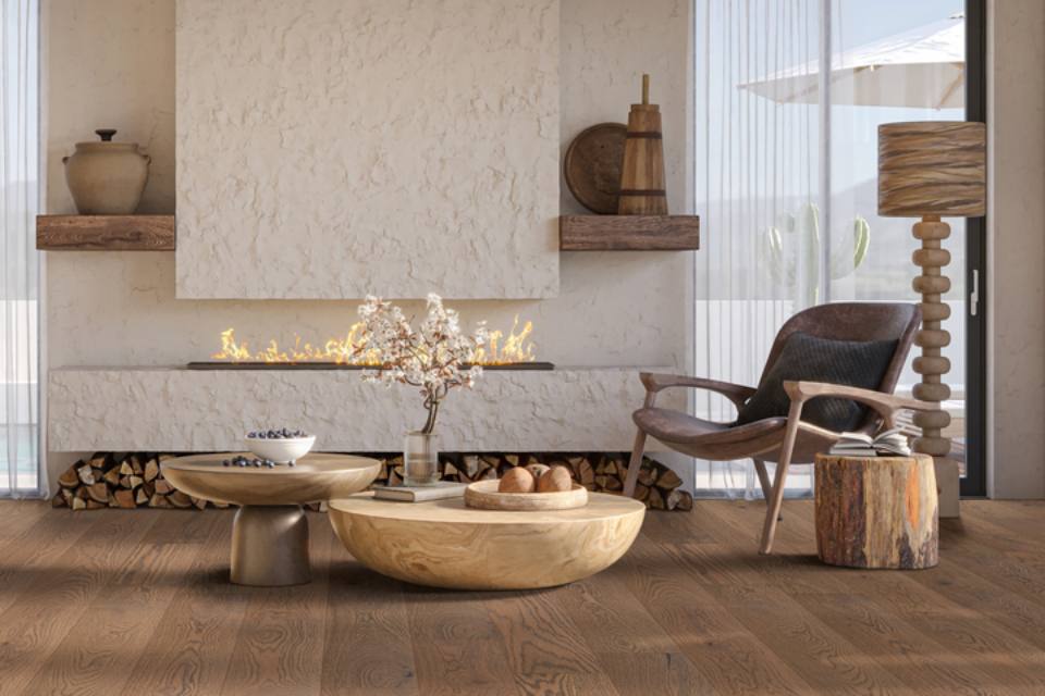 dark hardwood flooring in living room with wood decor.